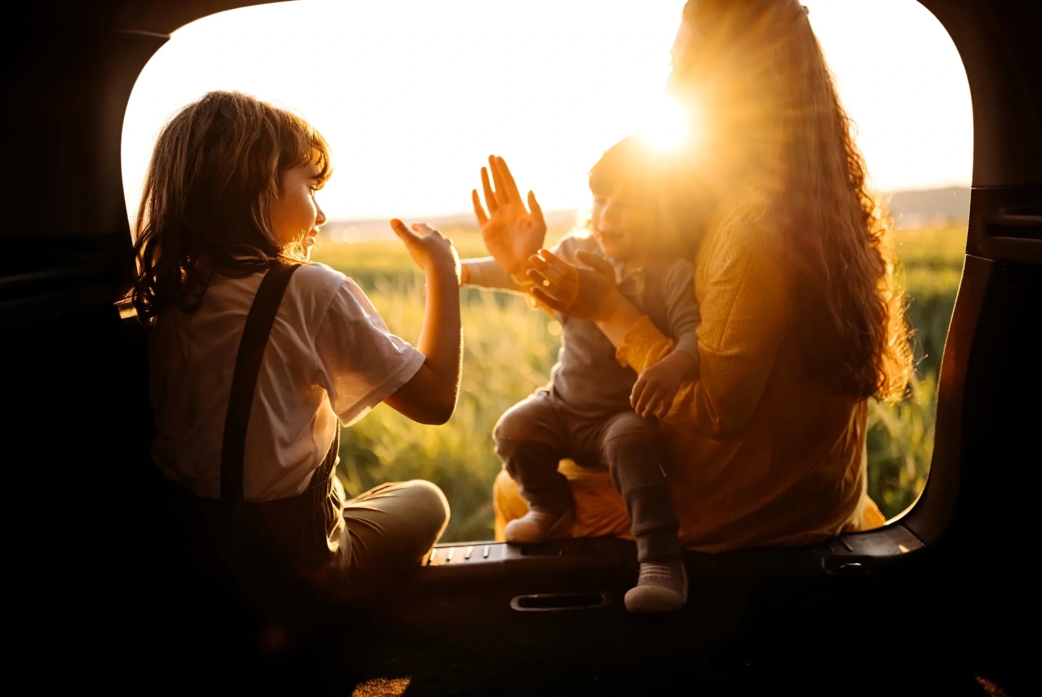 Family on a road trip adventure at golden hour